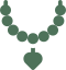 A green necklace is shown on the black background.