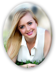 A woman in white shirt and grass background