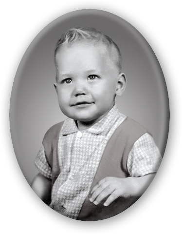 A young boy in an old photo.